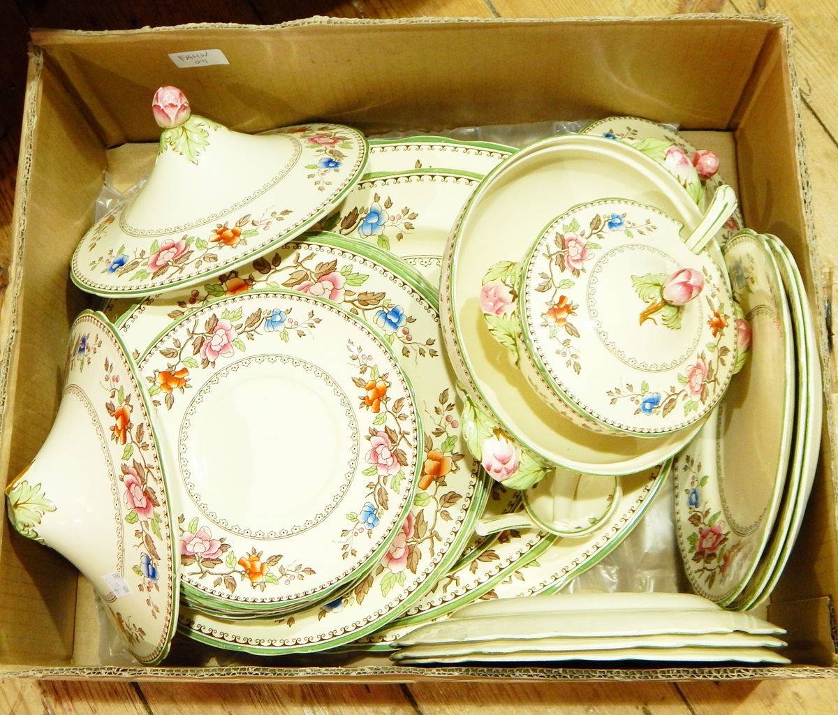 A Coalport part dinner service in the "Rosamund" pattern comprising graduated meat plates,