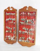 Two glazed cases of souvenir spoons including an enamelled silver example for The Square Compass