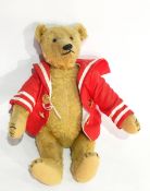 Small old Steiff gold plush bodied teddy having button to ear,