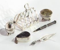 A silver four-division toast rack, a silver box of teardrop shaped form,