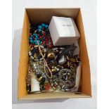 A large quantity of costume jewellery including a lady's Accurist bracelet watch, beads, etc.