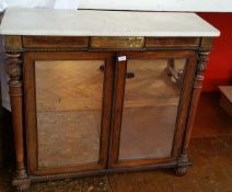 A nineteenth century rosewood and brass inlaid side cabinet, with marble top,