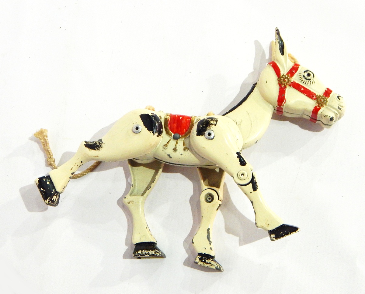 A diecast articulated puppet of Muffin the Mule