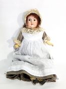 German(?) bisque headed doll, fixed eyes, open mouth, head incised "Alice",