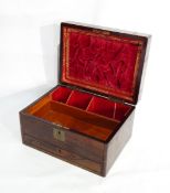 A Victorian rosewood writing box with velvet and tooled leather interior