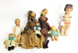 A pair of 19th century felt dolls and further cloth and wood dolls (1 box)