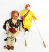 Early 20th century paper head and soft bodied doll in Turkish style dress and an Oriental puppet