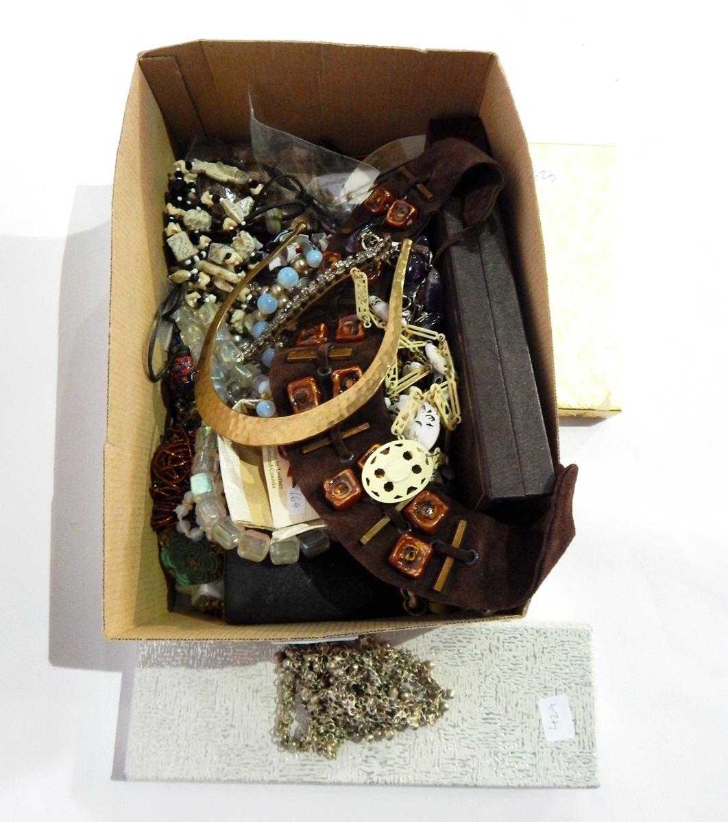 A quantity of costume jewellery including Murano glass beads, brooches, etc.