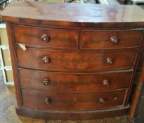 A Victorian mahogany bowfront chest of two short and three long graduated drawers,