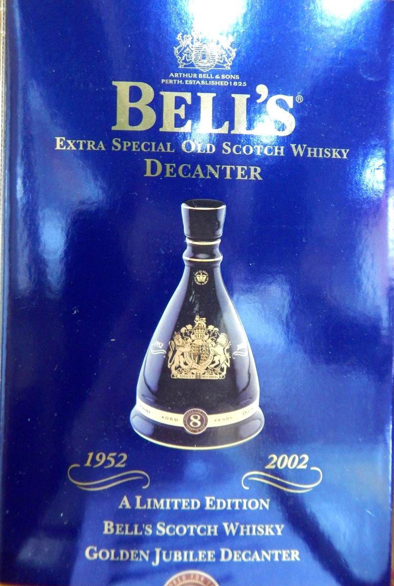 Bells Christmas decanters 1994, 2002,