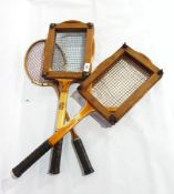 A Slazenger canvas tennis racquet bag and three wood racquets,