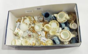A quantity of miniature cups and teapots, including Wedgwood,