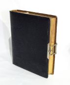 A Victorian leather bound photograph album and contents of family portraits,