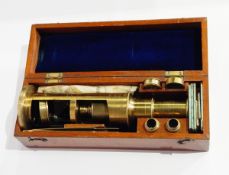 A brass monocular microscope by J H Steward, 406 Strand, London,