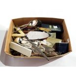 A quantity of silver plate including an embossed tankard and a large amount of cutlery