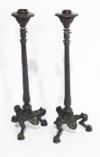 Pair 19th century bronze Regency-style candlesticks, each with leaf applied sconce,