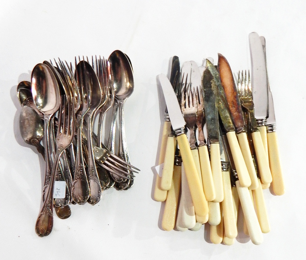 A large quantity of silver plated cutlery including fish knives and forks and part sets