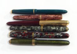 A Watermans fountain pen with pink marbled-effect case,