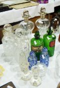 A quantity of glass to include two blue flash glass bottles, two green glass medical bottles,