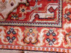 A Persian style carpet with geometric pattern, 160cm x 120cm and another Persian style carpet,