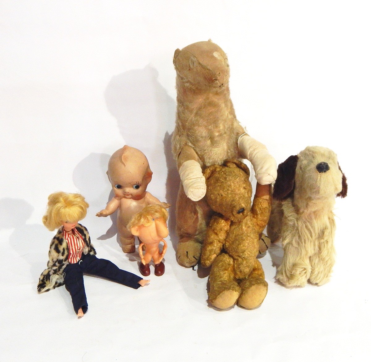 A quantity of early to mid 20th century soft toys and dolls including Chiltern baby doll,