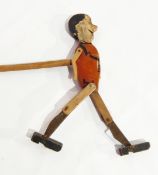 An old articulated walkalong figure toy