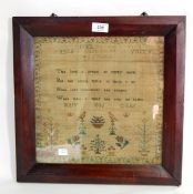 A 19th century sampler with alphabet, birds, flowers and motto by Mary Gibbs dated 1836,