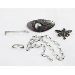 A silver brooch set with a blister pearl, a fairy brooch,