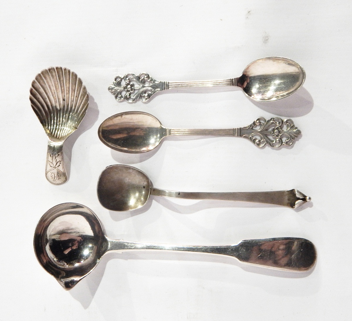 A silver jam spoon by Anthony Hawksley, London 1992, a George III Irish silver soup ladle,