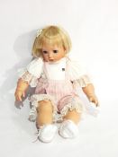 The Celia Doll Company bisque head doll with large blue eyes, open mouth,