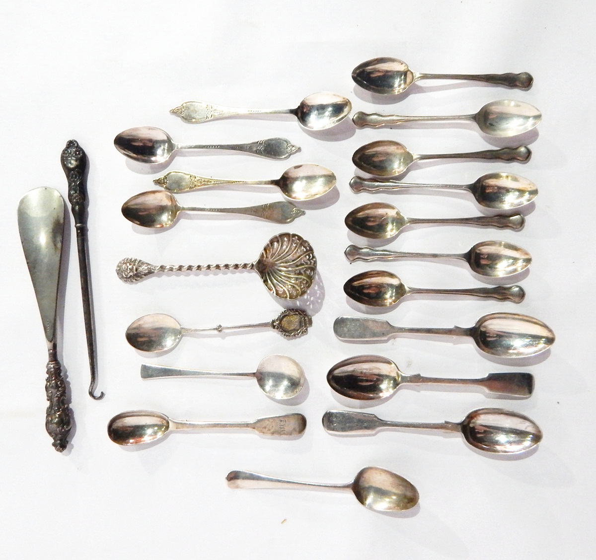 A set of four silver teaspoons with engraved decoration, Sheffield 1912,