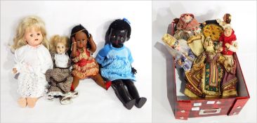 A black plastic walking doll with sound box,