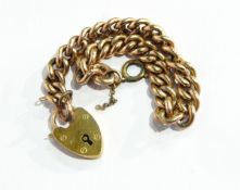 A 9ct gold curb link bracelet with padlock clasp, approximately 13.