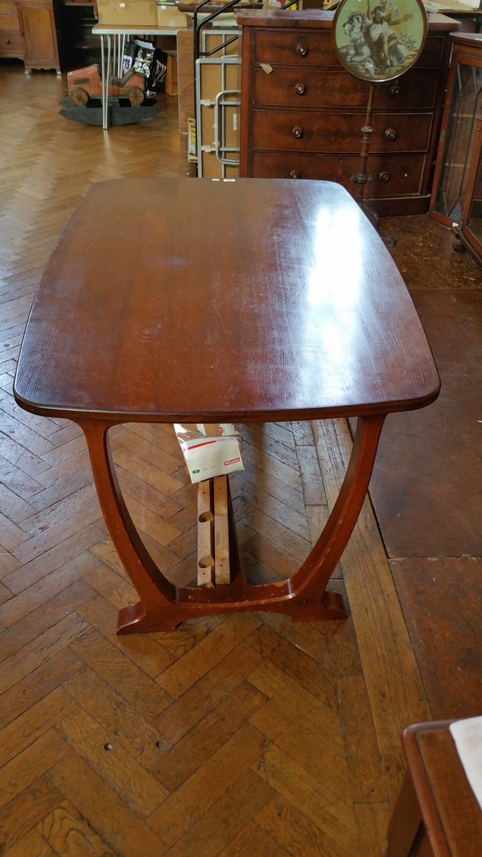 A contemporary oak rectangular top dining table in the manner of Oliver Morel with rounded corners,