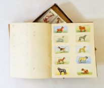 A quantity of cigarette cards including Wills "Dogs", Players "Footballers 1928",