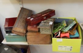 A quantity of assorted items including a Sadeli glove box and contents, assorted cap badges,