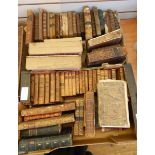 A large quantity of antiquarian books, mainly leather bound, many needing restoration,