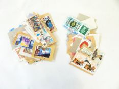 Accumulations of stamps in two envelopes to include commemorative Portugal and old currency,