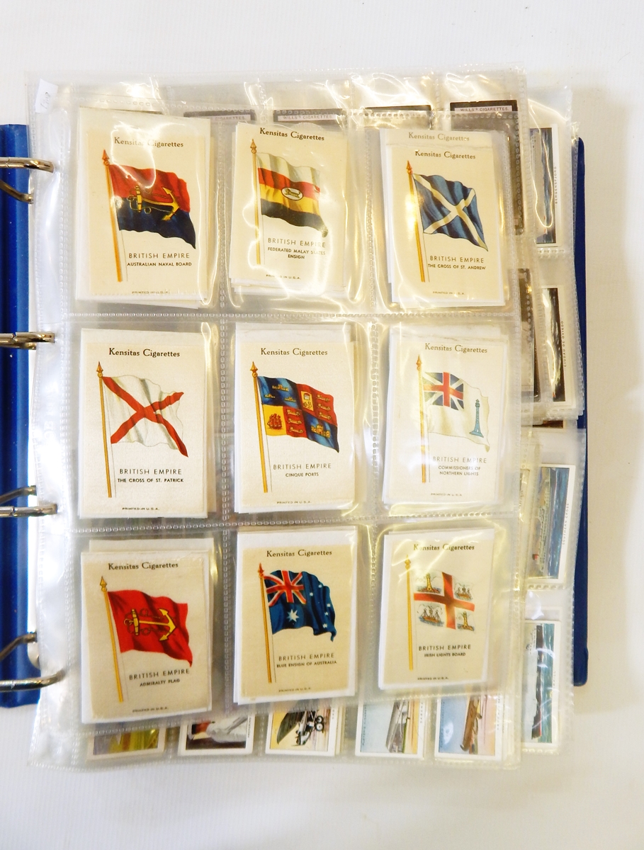 Blue cigarette card album including Kensitas Silks "British Empire Flags",