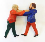 A Victorian political puppet of Gladstone & Disraeli facing one another,