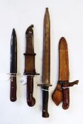 Three bayonets and fighting knife