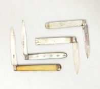 A collection of silver fruit knives,