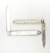 A silver fruit knife marked indistinctly,