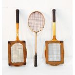 Two wooden tennis racquets, badminton racquet,