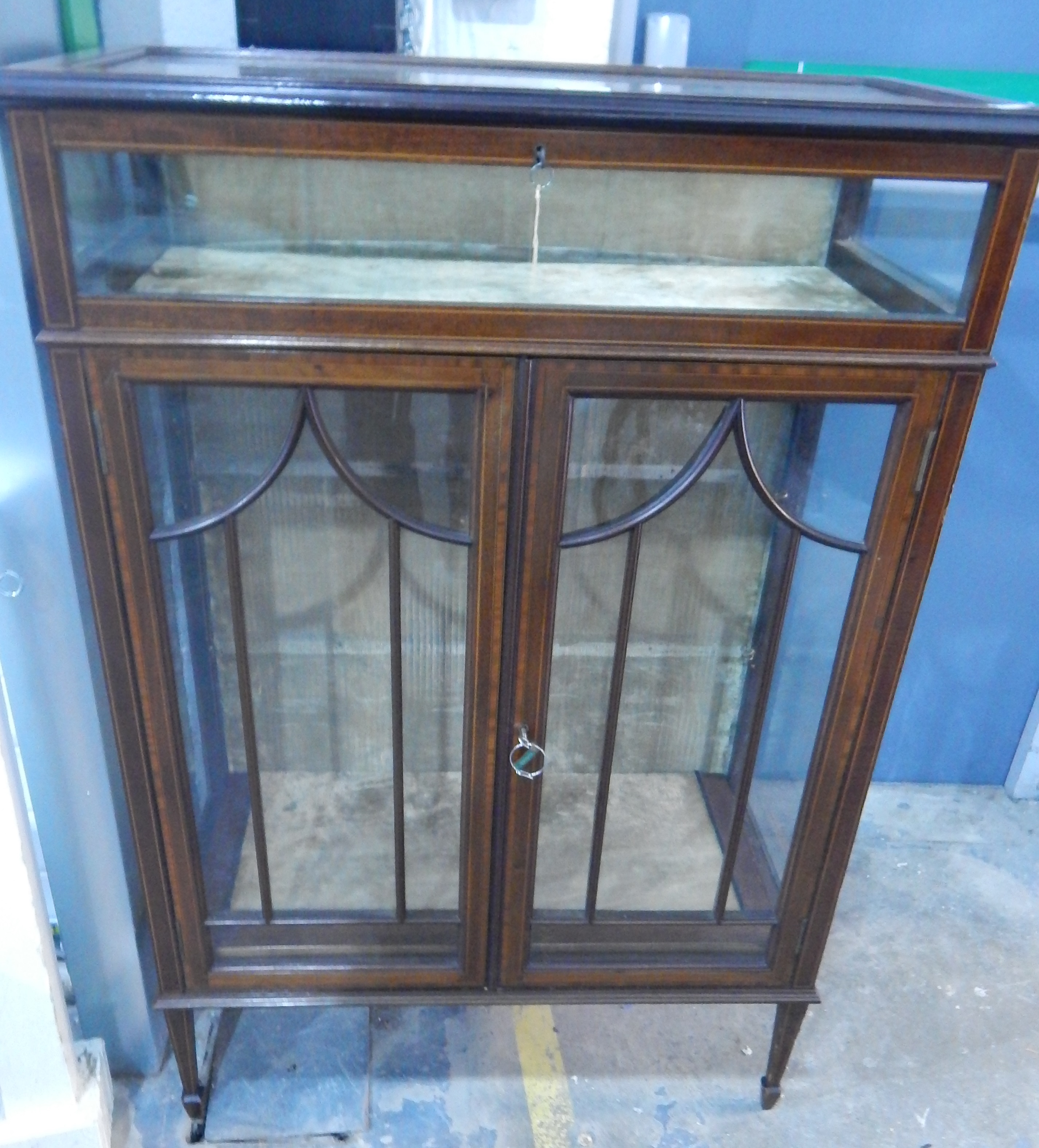 An Edwardian line inlaid mahogany dwarf display cabinet with vitrene top,