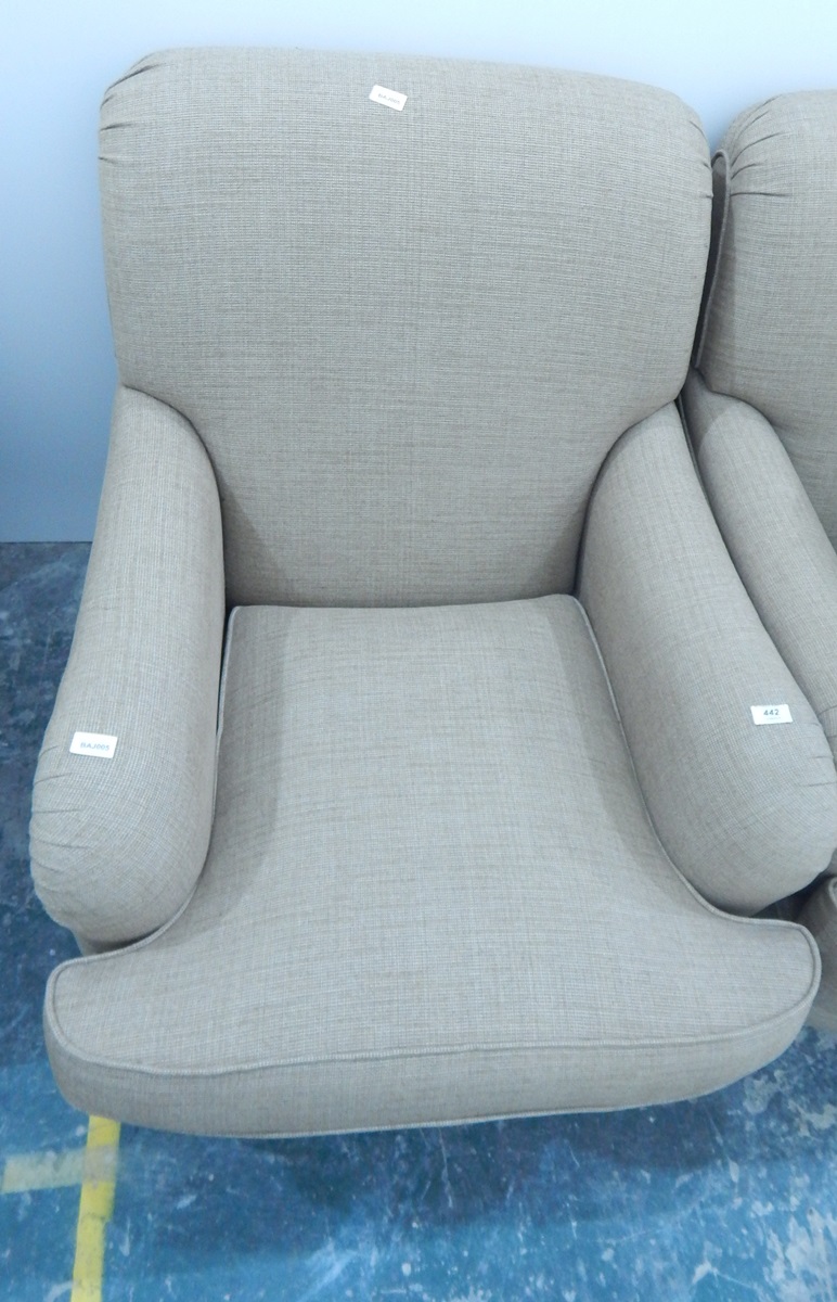 A pair of upholstered easy chairs and footstool to match,