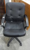 A black vinyl upholstered/soft leather office/computer chair