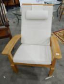 A pair of Arbor Vetum hardwood framed conservatory armchairs