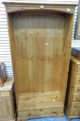 A pine open bookcase fitted a drawer to base,