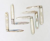 A collection of silver fruit knives and fruit forks with mother-of-pearl handles,
